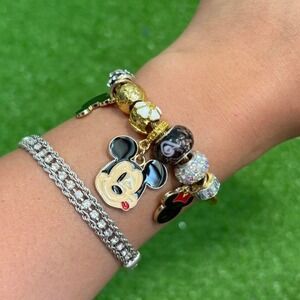 Disney Mickey Mouse charm bracelet in golden.